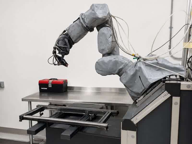 A six-axis robotic spray system provides exceptional consistency for demanding aerospace applications.