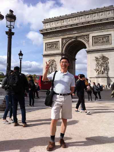 man standing in a plaza