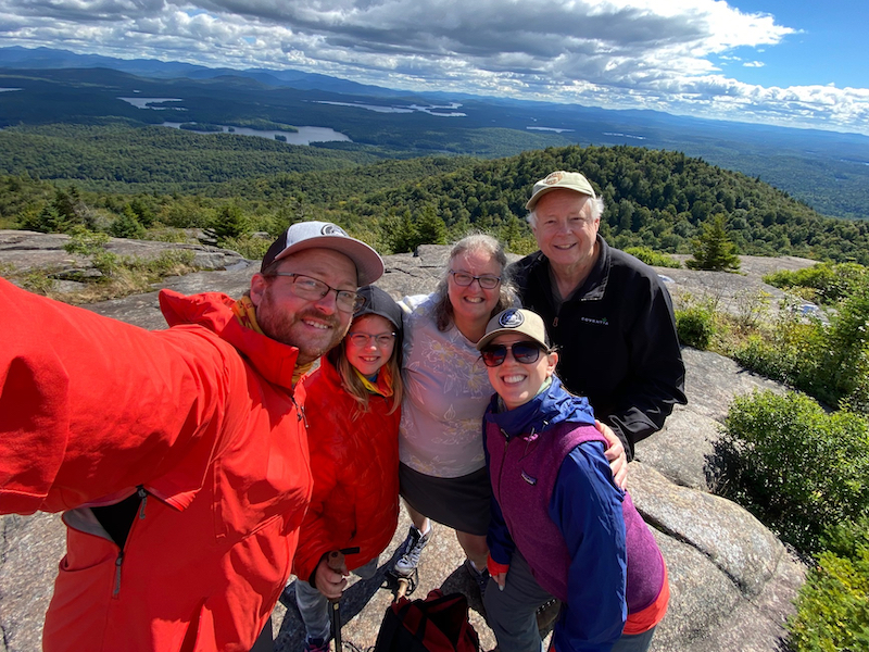 Atop Mt. Arab in the Adirondack Mountains; from left, son Dwight, granddaughter Olivia, wife Mary, Dwight’s girlfriend Meg, and Milt Stevenson.