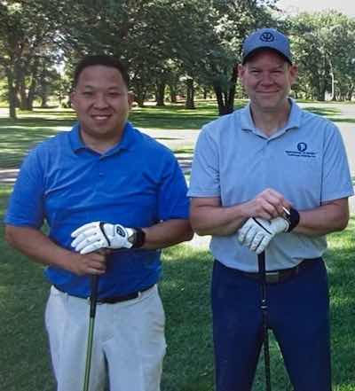 two men playing golf