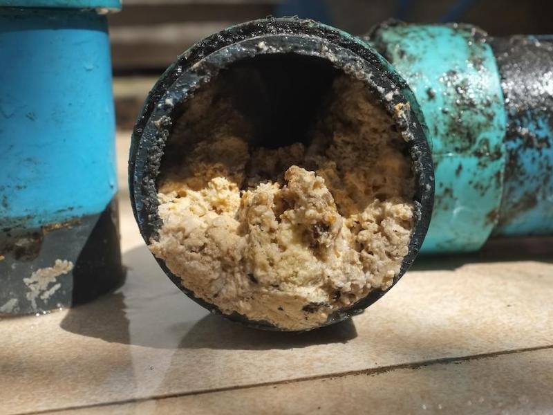 fats and grease in a pipe