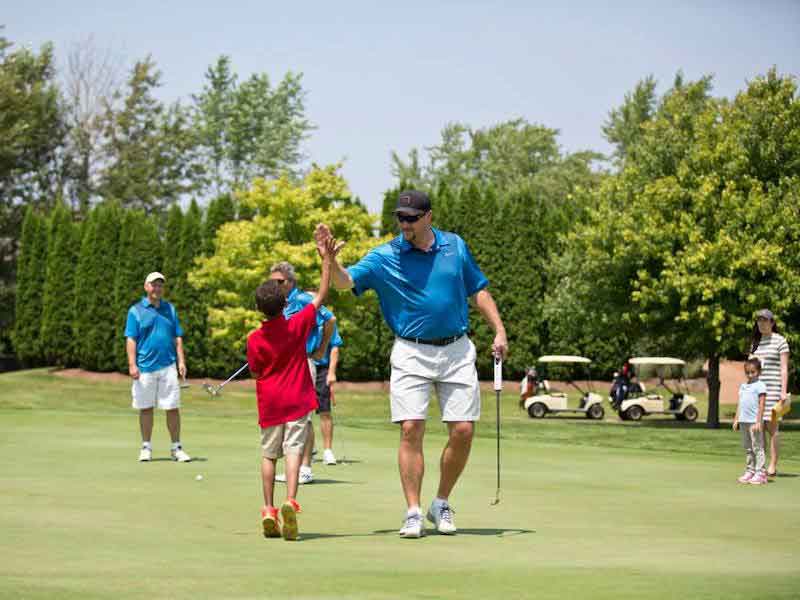 Jeff Maliszewski interacting with one of the kids at the charity outing that RPW helps support.