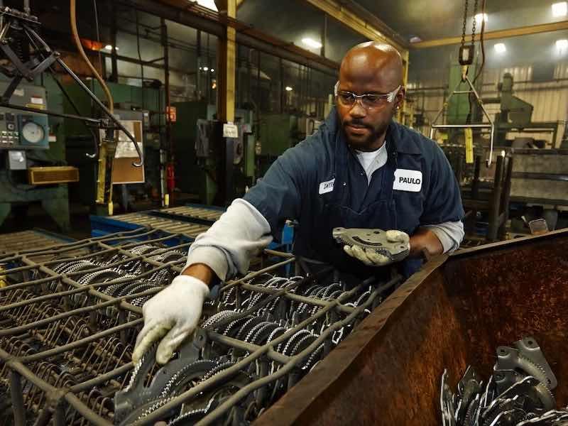 man sorting parts