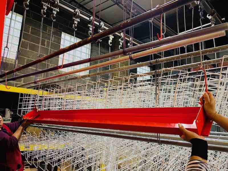 parts coming off an powder line