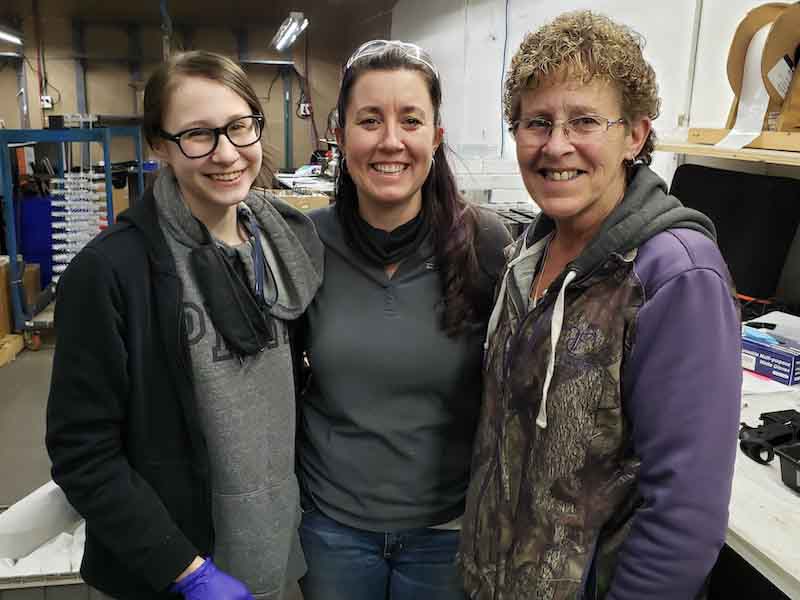 Three generations work at Alpha: center, Jamie Barrus is VP; at right, Linda Bateman is shipping manager and Jamie's mother; at left, BrieAnna Barrus is Jamie's daughter and began working at Alpha in production.