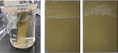 FIGURE 8: Front and back of steel panel coated with Alseal 5KST Cr-Free system deposited in the novel manner shown in FIGURE 7 after 1000 hrs. sealed in a beaker partly fill deionized water at 80oC (176oF).