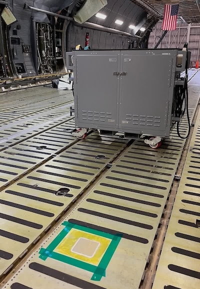 Figure 1. Volta system positioned on the C-5 cargo floor for localized SAA restoration