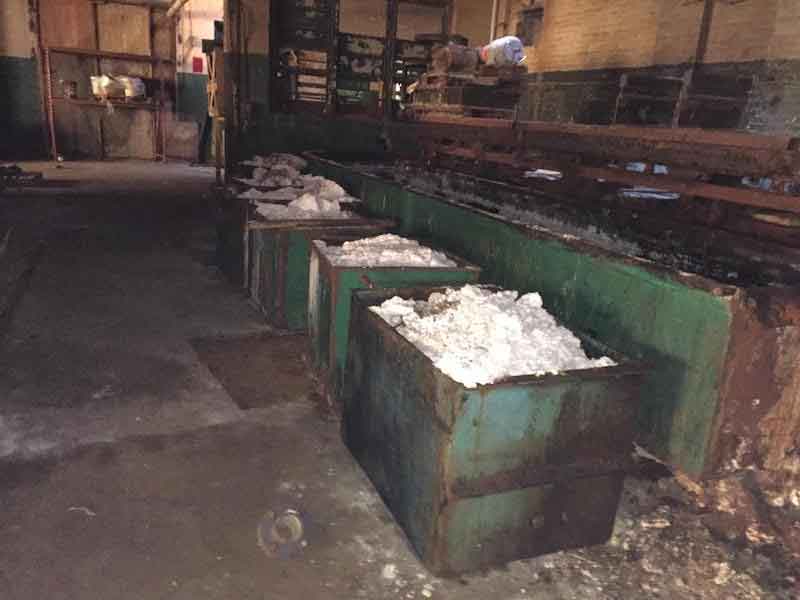 Vats containing unknown powder at the site