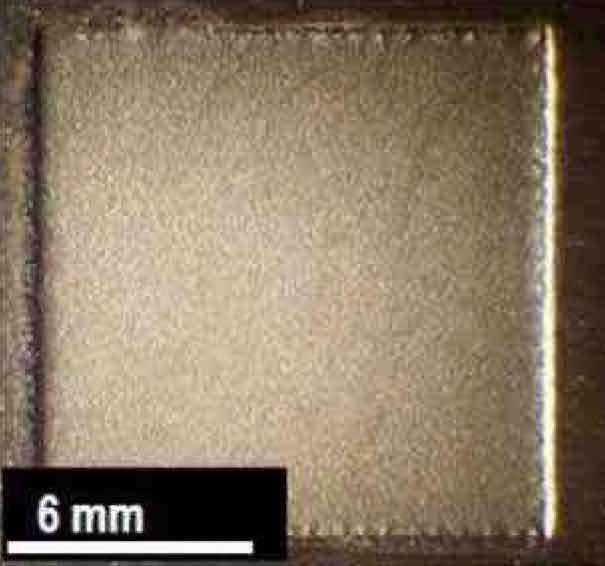 Figure 11âNb coupon of Run #5 after electrochemical polishing at 2.7 Î¼m/min in a H2SO4 electrolyte.