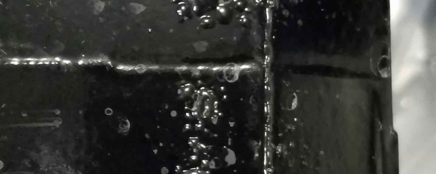 Image 1:  The water used in vacuum impregnation, or residual minerals in that water, may leave spots on the part. In worse cases, water may  alter the color hue in color or degrade the partâs finish.