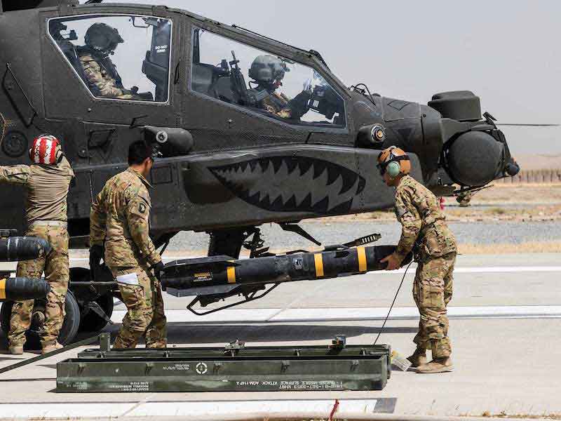 missile is loaded onto a helicopter