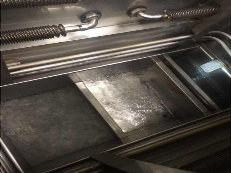 A typical two-chamber open-top vapor degreaser. Courtesy of Branson Precision Cleaning.