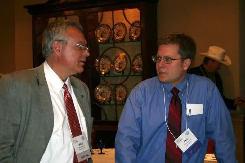 Barnstead back in his pre-Apple days, talking with Techmetals' President Phillip Brockman at an industry event.