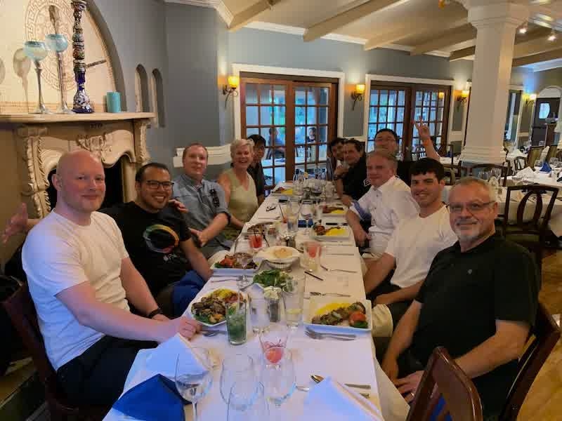 Barnstead and the U.S. and Asian Apple finishing teams celebrate at a dinner.