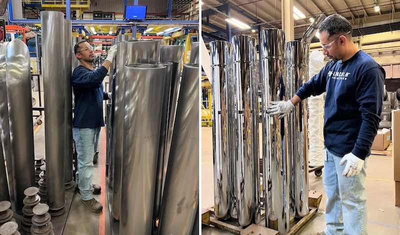 Lincoln team members work on polishing and protecting massive exhaust pipes for the trucking industry.