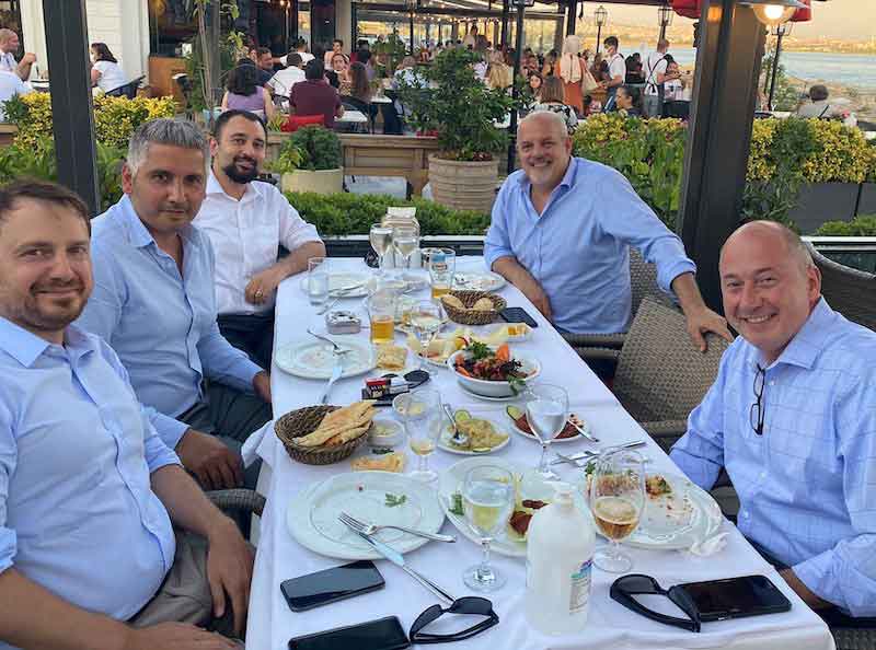 Lynch meets with members of MEIS' European team.