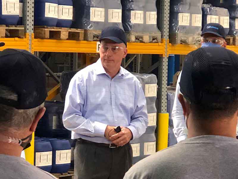 man standing in factory
