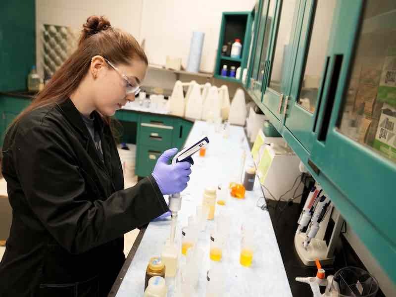 Adriana Wood, 802nd Maintenance Support Squadron Chemical Analysis Laboratory chemist, analyzes electro plating tank samples for the Advance Metal Finishing Facility at Robins Air Force Base, Georgia, May 21, 2015. The chemicals were tested to ensure they were within technical order specifications. (U.S. Air Force photo by Joseph Mather)