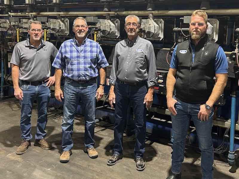 J&M Plating owners Rick, Dave, and Mark Morris and Nic Krause, President of the company.