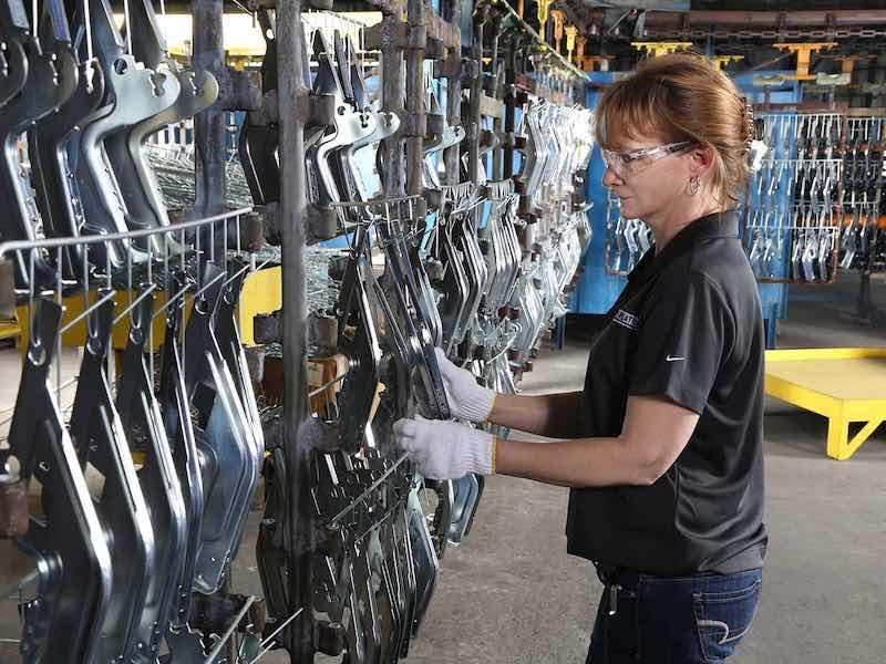 worker hanging parts