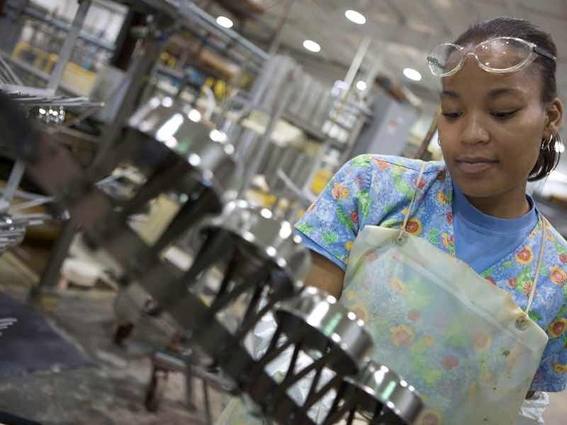 person performing electropolishing