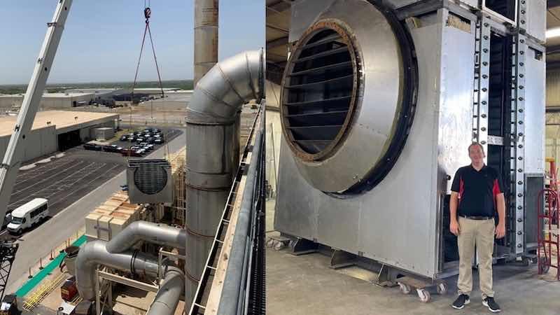 Jason Swadick stands next to one of the two newly installed heat exchangers at Toyota Texas, helping reduce the company's natural gas and water consumption.