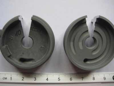 Figure 9: Documentary photograph of die cast components which exhibited non-uniform finish thickness. Sections were taken from each part for metallographic examination.