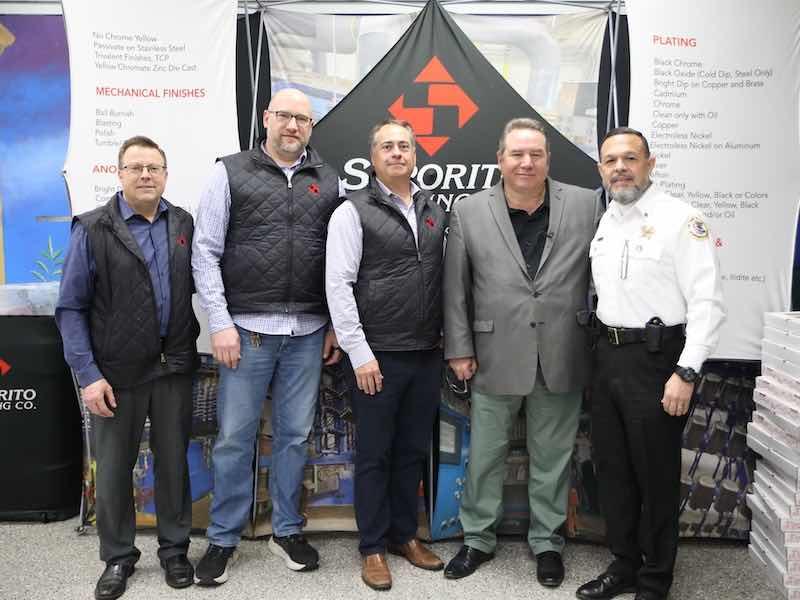 The Saporito Metal Finishing with officials from Cicero fire department.