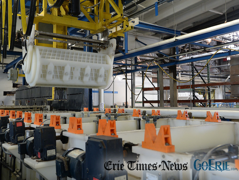 A barrel plater is operated at Great Lakes Metal Finishing Inc. in Erie. [JACK HANRAHAN/ERIE TIMES-NEWS]