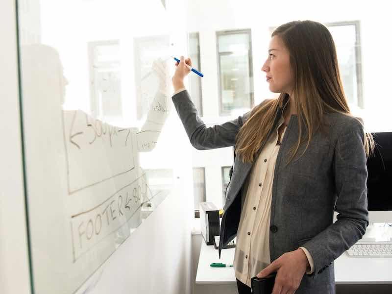 woman at whiteboard