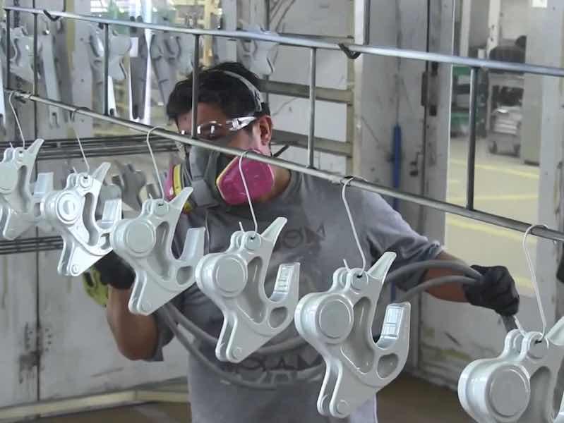 man coating parts