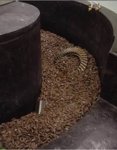 Figure 2 - Large vibratory bowl filled with large ceramic media.