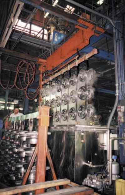 This 900-gallon ultrasonic cleaning tank is an integral part of a high-throughput plating line.