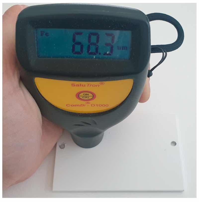 Figure 4. Measuring the thickness of the applied protective layer.